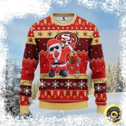 Show your 49ers pride this holiday season with this festive Santa Dab Christmas sweater! Perfect for tailgating or spreading holiday cheer. Shop now and get yours before they're gone! - Image 1 - rugbyfanstore.com