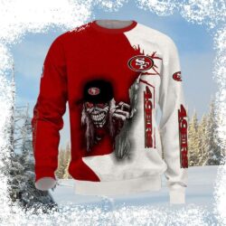 Show your 49ers pride with this hilarious, red and white ugly sweater featuring a grinning skull. Perfect for game day or any holiday party! Shop now and get free shipping on orders over $50. - Image 1 - rugbyfanstore.com