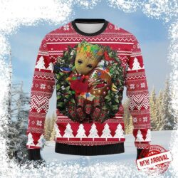 Show your love for the Arizona Cardinals and Groot with this hilarious ugly Christmas sweater! Featuring Groot holding a football, this sweater is perfect for game day or any holiday gathering. Get yo - Image 1 - rugbyfanstore.com