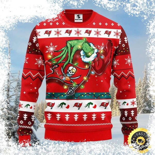 Show your Tampa Bay Buccaneers pride this holiday season with this hilarious Grinch-themed ugly Christmas sweater! Featuring the Buccaneers logo, this festive sweater is perfect for game day or any ho - Image 1 - rugbyfanstore.com