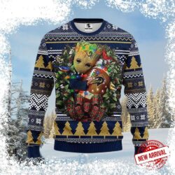 Show your Rams pride this Christmas with our hilarious Baby Groot wreath ugly sweater! Perfect for game day or holiday gatherings. Shop now and get ready to cheer on the Rams in style! - Image 1 - rugbyfanstore.com