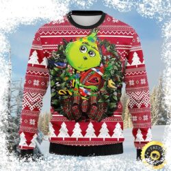 Show your Cardinals spirit with this hilarious Grinch-themed Ugly Christmas sweater! Featuring a festive wreath and the iconic Grinch, this sweater is perfect for holiday gatherings. Shop now and spre - Image 1 - rugbyfanstore.com