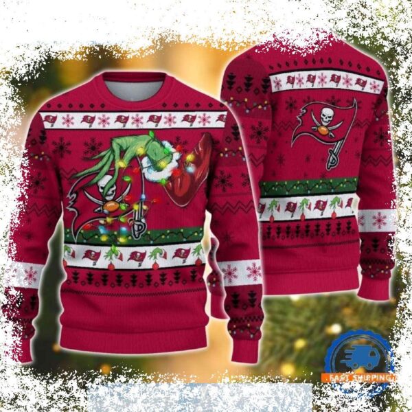 Show your Tampa Bay Buccaneers pride this holiday season with this hilarious Grinch-themed ugly Christmas sweater! Perfect for game day or holiday parties, this sweater is sure to get you noticed. S - Image 1 - rugbyfanstore.com