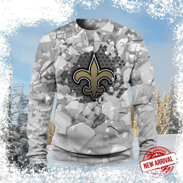 Show your Saints pride this Christmas with this stunning shattered ice effect sweater featuring the Fleur-de-lis! Perfect for game day or holiday gatherings. Shop now and get ready to cheer! - Image 1 - rugbyfanstore.com