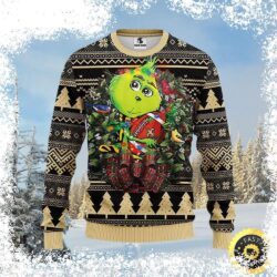 Show your Who Dat pride with this hilarious New Orleans Saints Green Grinch Holding Football Ugly Sweater! Perfect for the holiday season, this unique sweater is sure to turn heads. Shop now and sprea - Image 1 - rugbyfanstore.com