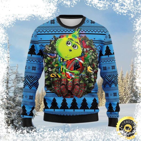 Show your Carolina Panthers pride this holiday season with our hilarious Grinch with Wreath ugly Christmas sweater! Perfect for game day or holiday gatherings, this sweater is sure to get you noticed. - Image 1 - rugbyfanstore.com