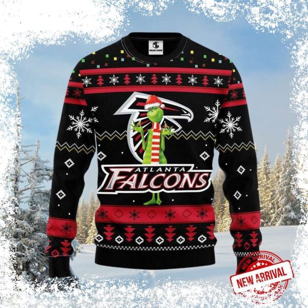 Spread holiday cheer (and a little Grinch-inspired mischief) with this stylish black ugly Christmas sweater featuring the iconic Grinch and Falcons logo. Shop now for the perfect holiday gift! - Image 1 - rugbyfanstore.com