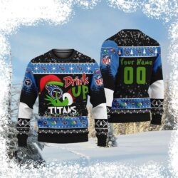 Show your Tennessee Titans pride this Christmas with our Grinch-themed ugly sweater! Customize it with your name for a unique holiday look. Order now and spread some festive cheer! - Image 1 - rugbyfanstore.com