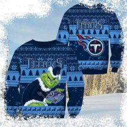 Show your Tennessee Titans pride this Christmas with this hilarious Grinch holding a football sweater! Perfect for game day or holiday gatherings. Shop now and get yours before they're gone! - Image 1 - rugbyfanstore.com