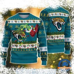 Show your Jacksonville Jaguars pride this Christmas with our hilarious Grinch Holding Stocking Ugly Xmas Sweater! Get ready to spread holiday cheer (and laughter) with this unique design. Shop now and - Image 1 - rugbyfanstore.com