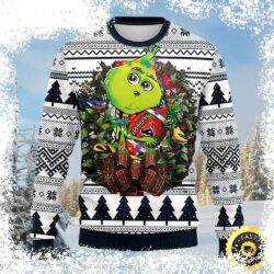 Show your Houston Texans pride this Christmas with this hilarious Grinch-themed sweater! Featuring a festive Grinch holding a Texans football, it's the perfect gift for any fan. Shop now and get you - Image 1 - rugbyfanstore.com