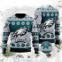 Show your Eagles pride this holiday season with our hilarious and festive "Snowflakes Delight" Ugly Christmas Sweater! Perfect for game day or holiday gatherings. Shop now! - Image 1 - rugbyfanstore.com