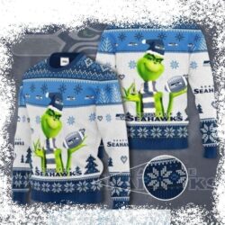 Show your Seahawks pride this holiday season with our hilarious Grinch-themed ugly Christmas sweater! Featuring a snowflake design and Seattle Seahawks colors, this sweater is perfect for festive fun. - Image 1 - rugbyfanstore.com