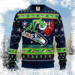 Show your Seahawks pride this holiday season with our hilarious Graphic Grinch And Christmas Light Seahawks Ugly Christmas Sweater! Get ready to be the talk of the party. Shop now! - Image 1 - rugbyfanstore.com