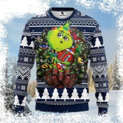 Show your Seahawks pride this Christmas with this hilarious Grinch-themed ugly sweater! Featuring a green Grinch hugging a football, it's the perfect gift for any fan. Shop now and spread some holiday - Image 1 - rugbyfanstore.com