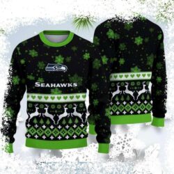 Show your Seahawks pride in style with this cozy sweater featuring reindeer motifs and snowflakes. Perfect for chilly game days! Shop now and stay warm while cheering on your team. - Image 1 - rugbyfanstore.com