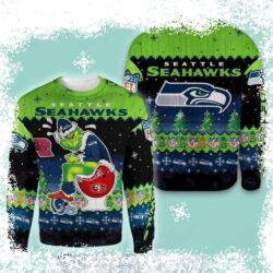 Show your Seahawks pride with this hilarious Christmas sweater! Featuring the Grinch sitting on a Broncos toilet with a Seahawks helmet, it's sure to be a conversation starter. Get yours today and spr - Image 1 - rugbyfanstore.com